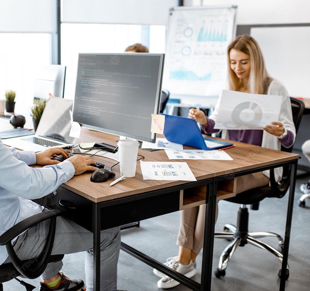 Team of digital marketing professionals analyzing data and developing creative strategies at Nativz